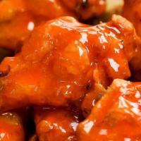 Buffalo Wings Double (20 Pieces) · 20 succulent Wings with Carrots, Celery and Blue Cheese or Ranch