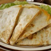 Cheese Quesadilla · Grilled tortilla, Cheddar, Jack cheese, and fresh salsa.