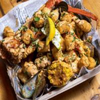Snow Crab · Favorite. Served with New Zealand mussels, shrimp, corn and potatoes. Tossed in garlic butte...