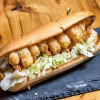 Fried Shrimp Hoagie · Fried shrimp with tartar sauce and iceberg lettuce in a hoagie roll.