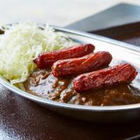 Sausage 3Pc Curry · 3 premium Kurobuta pork sausages with Japanese curry and shredded cabbage over rice. Curry s...