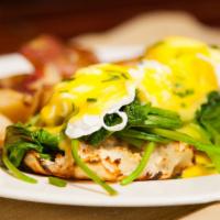 Organic Eggs Florentine · Made with an English muffin, steamed spinach, two organic poached eggs, our homemade holland...