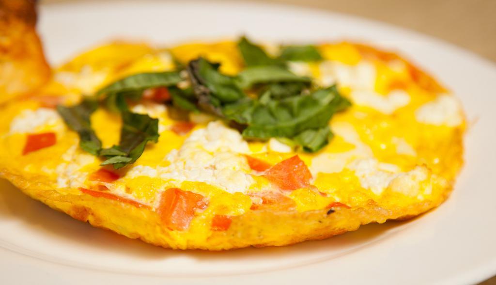 4 Organic Egg Baked Frittata · Served with a Homemade Buttermilk Biscuit. Italian baked omelette, made with four organic eggs. Includes coffee or tea.