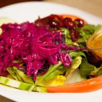 Large House Salad · Mixed greens, tomatoes, cucumbers, radicchio, cranberry chutney and an Italian vinaigrette d...