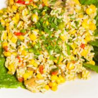 White Rice Salad · White rice with red peppers, corn, mushrooms, scallions and a red pepper and basil sauce.