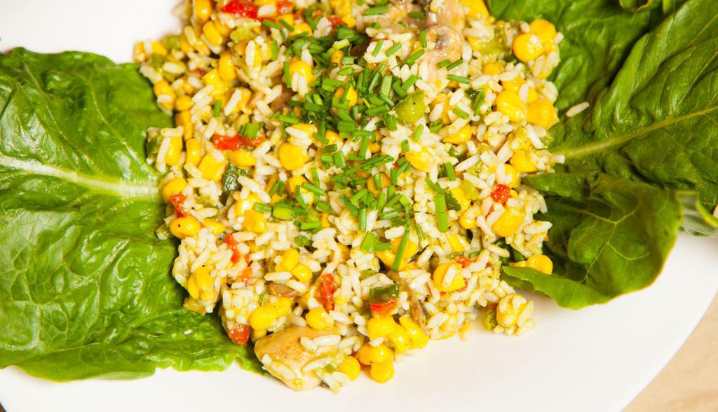 White Rice Salad · White rice with red peppers, corn, mushrooms, scallions and a red pepper and basil sauce.