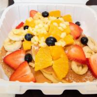 All Fresh Fruit Rainbow Pancakes · Hawaiian macadamia nut pancakes with fresh bananas, strawberries, kiwi, blueberries, pineapp...