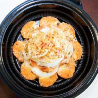 Garlic Shrimp Plate · Shrimp sautéed in our home-made garlic sauce with white onions. Served with rice or home fri...