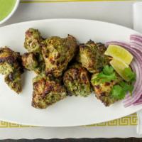Hara Kothmiri Chicken Tikka · Creamy paste of fresh coriander leaves with nuts and spices, grilled.