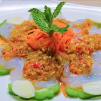 Y-9. Raw Shrimp Salad · Raw shrimp served with bitter melon, fresh garlic, and topped with Ayada’s signature spicy s...