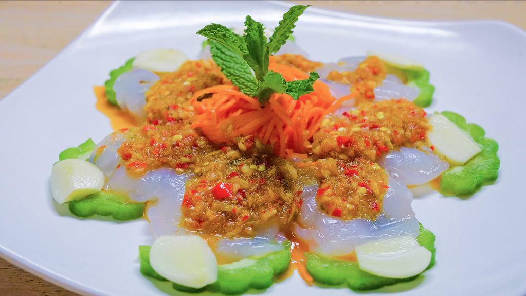 Y-9. Raw Shrimp Salad · Raw shrimp served with bitter melon, fresh garlic, and topped with Ayada’s signature spicy seafood sauce.