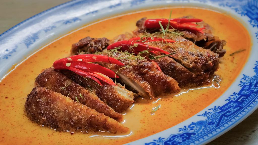 Crispy Duck Panang Curry · **New York Times Recommend**
Crispy duck in a coconut milk based panang curry.