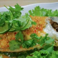Steam Fish Spicy Lime Juice Sauce · Steam fish With garlic lime juice and spicy chilli