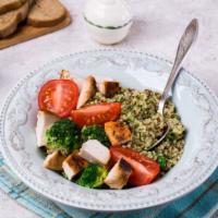 Pesto Chicken Quinoa Bowl · Pesto marinated chicken with broccoli, spinach, chopped kale, green peas, scallions, and asp...