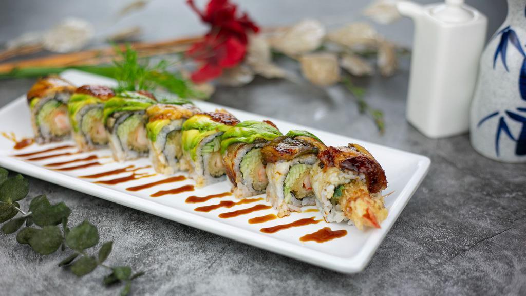 L6 Tiger Roll · Shrimp tempura, cucumber inside. topped w. eel & avocado eel sauce