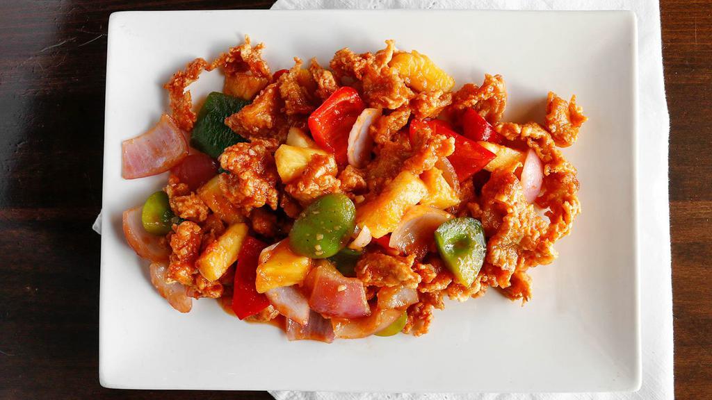 L- Pineapple Chicken · Crispy white meat chicken sauteed with fresh pineapple, bell pepper, and onion in pineapple sauce. Served with rice & soup.
