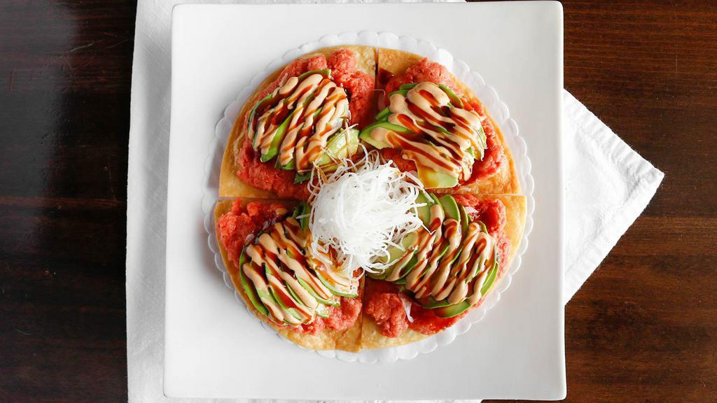 Sushi Pizza · Choice of sp tuna, sp salmon or sp crab, avocado, tomato, and onion topped on crispy pancake.