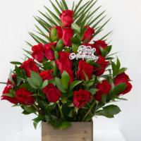 Big Rose Wood  Arrangement · Assorted flower arrangement in a wooden box.
