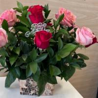 12 Rose Arrangement  · 12 red & pink roses in a cute small tree bark box.