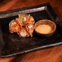Popcorn Lobster · Coarsely chopped lobster tempura served with homemade spicy mayo. Topped with tobiko and sea...
