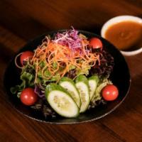House Salad · Served with our house dressing
