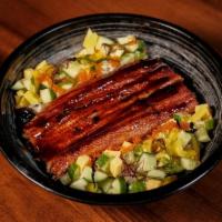 Unagi Don · Broiled eel on a bed of sushi rice, garnished with diced tamago, cucumber, pickle, tobiko an...