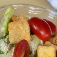 Garden Salad · Romaine lettuce, croutons, tomatoes, cucumbers, onions, & grated parmesan cheese