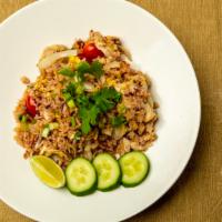 Thai Fried Rice · With egg, tomatoes, onions, scallions.