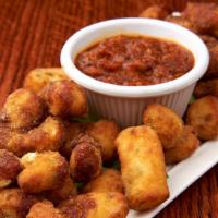 Grownup Cheese Sticks · Fried garlic cheese curds, balsamic reduction, 
spicy pomodoro sauce