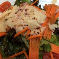 Moon Salad · Red leaf lettuce, grape tomatoes, carrots, red onions, garlic croutons, shaved romano, balsa...