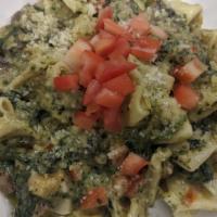 Tortellini · Four cheese tortellini, shallots, zucchini, yellow squash, fried eggplant & fresh basil in e...