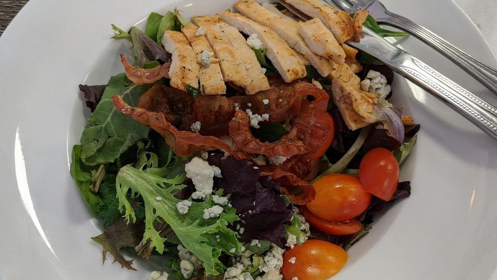 Cobb Salad Lunch · Romaine, bacon, grilled chicken, grape tomatoes and avocado with blue cheese dressing.