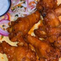 Chicken Wings · sweet and spicy wings, ancho dip