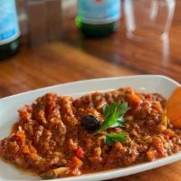 Ezme · Finely Chopped tomatoes, green pepper, onions, walnut, garlic, and olive oil