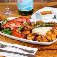 Chicken Kebab · Chunks of marinated chicken breast char-grilled on skewers