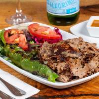 Gyro Doner · Thinly sliced beef and lamb combination, roasted on a vertical spit grill