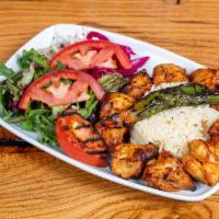 Grilled Chicken · Char-grilled marinated boneless chicken tight on skewers