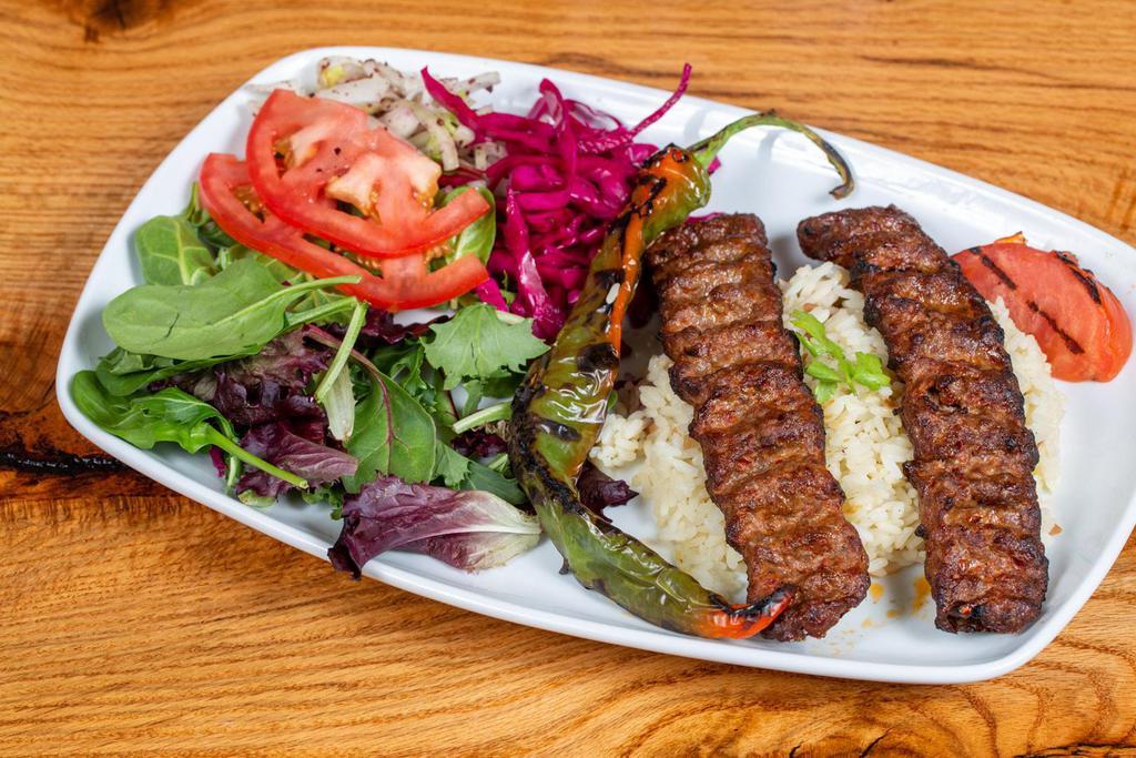 Lamb Adana Kebab · Ground lamb with red bell peppers, slightly seasoned with spices and char-grilled on skewers