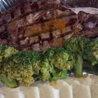 Rib Eye Steak · Ribeye steak grilled to your perfection, served with broccoli and mashed potatoes.