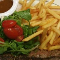 Steak Au Poivre · Green Peppercorn Sauce & French Fries.