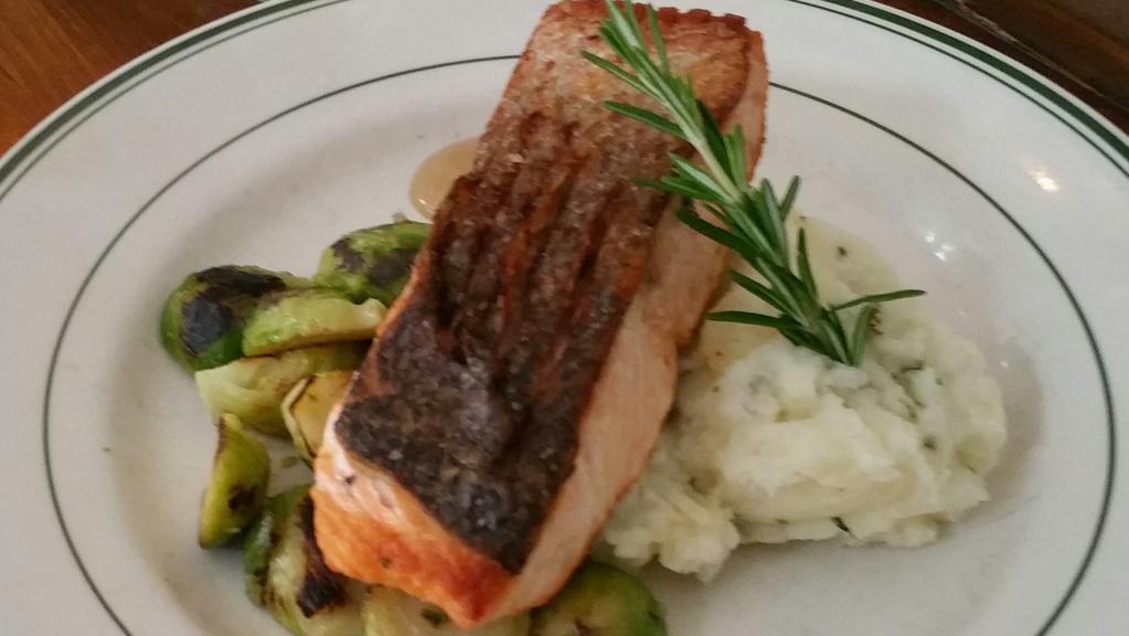 Pan Roasted Atlantic Salmon · Herbed Mashed Potatoes, Roasted Brussel Sprouts, Truffle Mushroom sauce