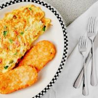 Western Omelette · Served with fries french fries or hash browns and toast.