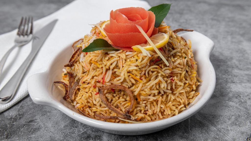 Lamb Biryani · Lamb meat cooked in basmati rice with mild spices.