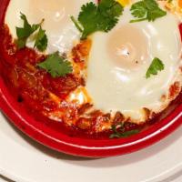 Shakshuka · Traditional Israeli 3 egg breakfast with pepper, onions, and special tomato sauce.