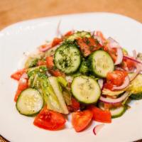 Garden Salad · Vegetarian, gluten-free. tomatoes, kirby, red onion, mixed greens, sunflower oil.
