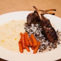 Rack Of Lamb · Gluten-free. French cut of lamb in caramelized green onion and mustard sauce served with wil...
