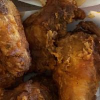 Chicken Wings · With Your Choice Of Honey BBQ, Garlic Parmesan, Mango Habanero, BBQ, Buffalo, and Sweet Crun...