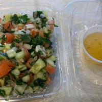 Middle Eastern Salad* · 16 oz of mixture of tomatoes  ,cucumber , onion parsley topped with extra virgin  oil vinega...