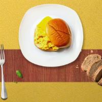 Cheesy Egg Sandwich · Two scrambled eggs and cheeseserved on your choice of bread.