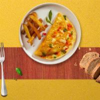 Western Best Omelette · Scrambled eggs, chopped ham, bell peppers, and onion as an omelette.